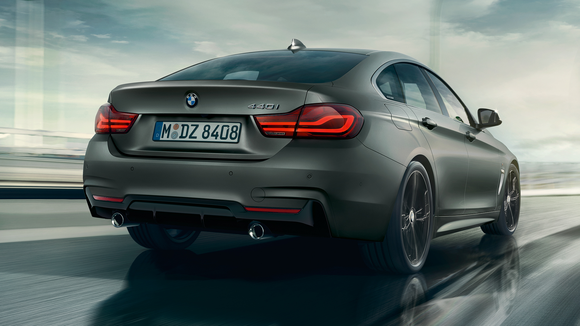 BMW Serie 4 Gran Coupé, toma en la parte trasera de tres cuartos BMW Serie 4 Gran Coupé, toma en la parte trasera de tres cuartos