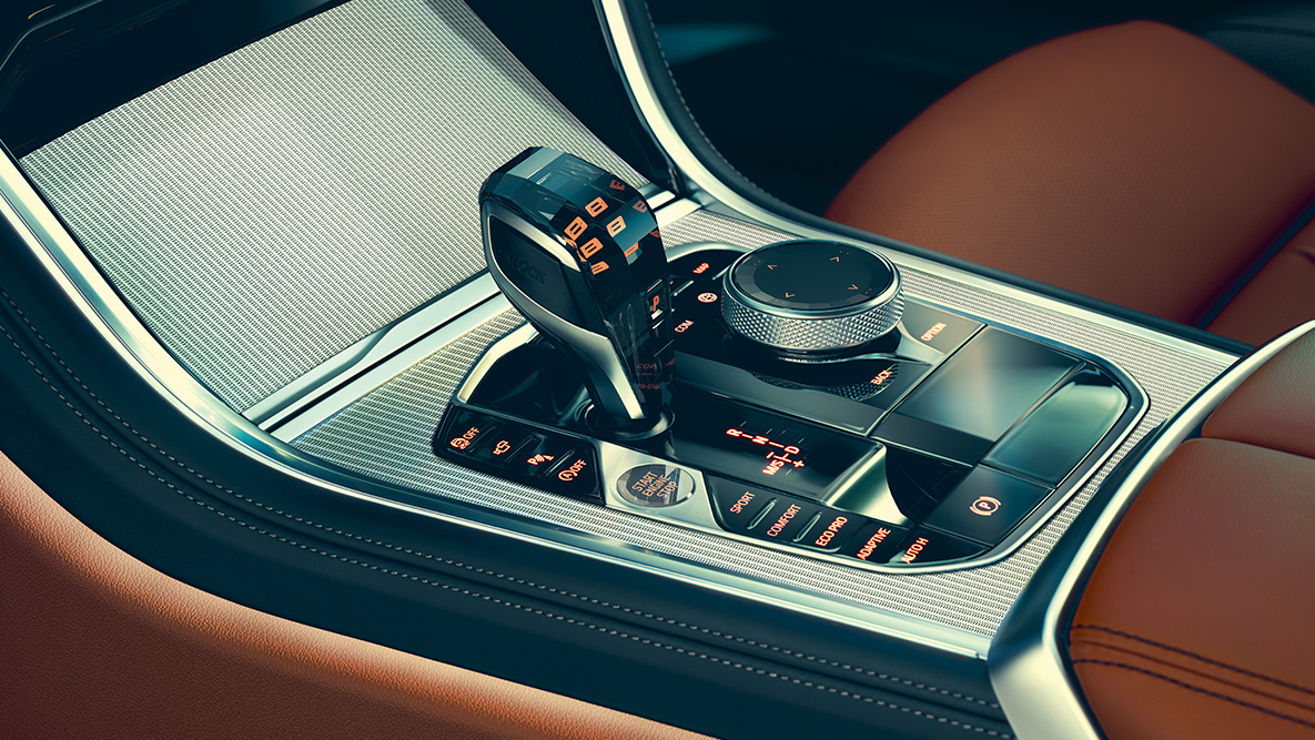 BMW Serie 8 Coupé, consola central. Acercamiento del interior del BMW Serie 8 Coupé con enfoque en la consola central.
