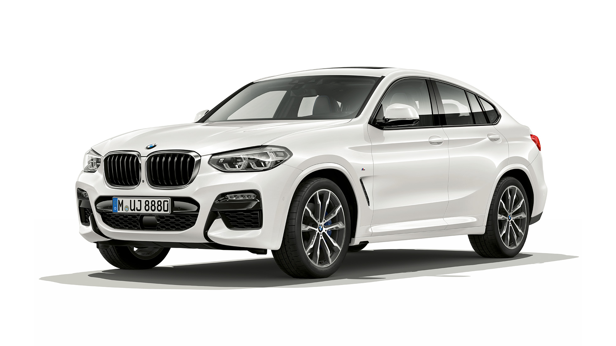 Vista frontal de tres cuartos del BMW X4 Modelo M Sport Vista frontal de tres cuartos del BMW X4 xDrive30i Modelo M Sport 2018 Alpine White