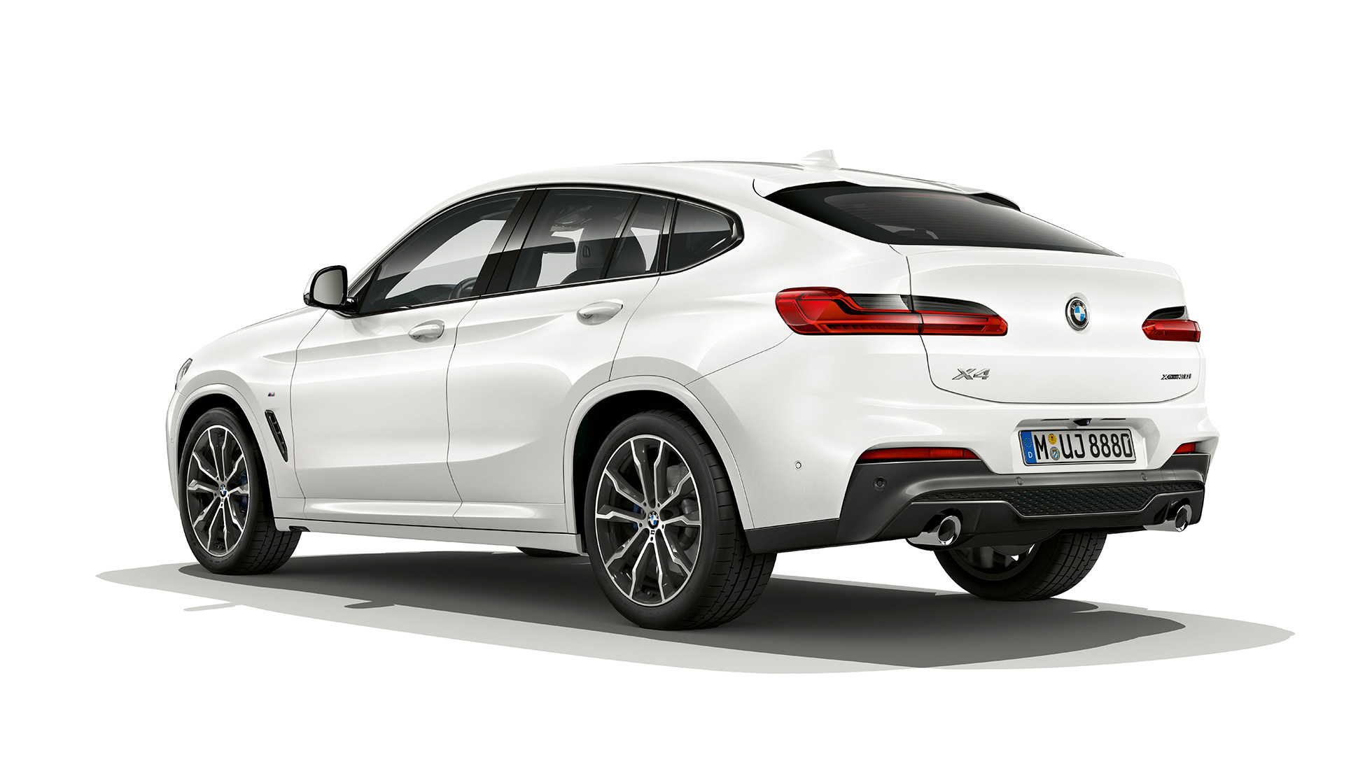 Vista trasera de tres cuartos del BMW X4 Modelo M Sport Vista trasera de tres cuartos del BMW X4 xDrive30i Modelo M Sport 2018 Alpine White