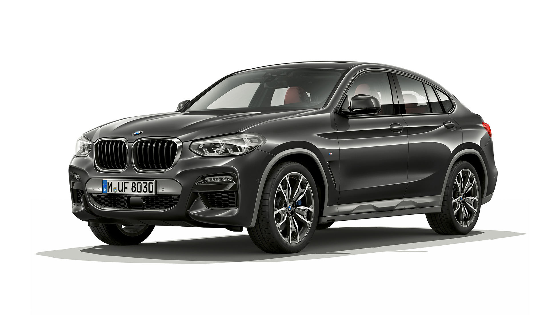 Vista frontal de tres cuartos del BMW X4 Modelo M Sport X Vista frontal de tres cuartos del BMW X4 xDrive30i Modelo M Sport X 2018 Sophisto Grey efecto brillante