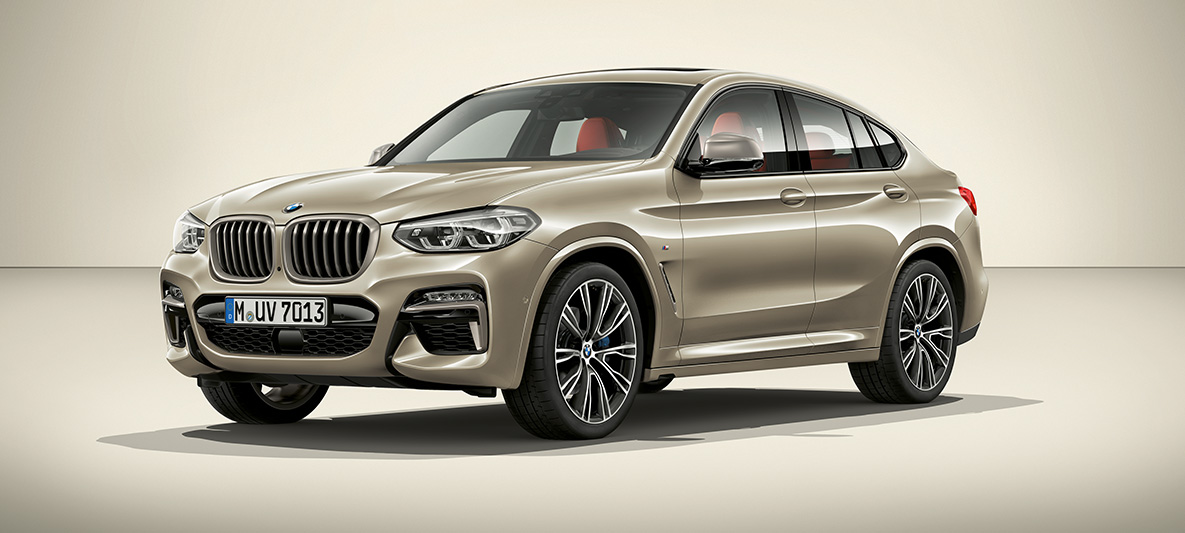 BMW Individual Sun Stone metálico BMW X4 Vista lateral de tres cuartos de la Colección BMW Individual del BMW X4 2018 Sun Stone metálico