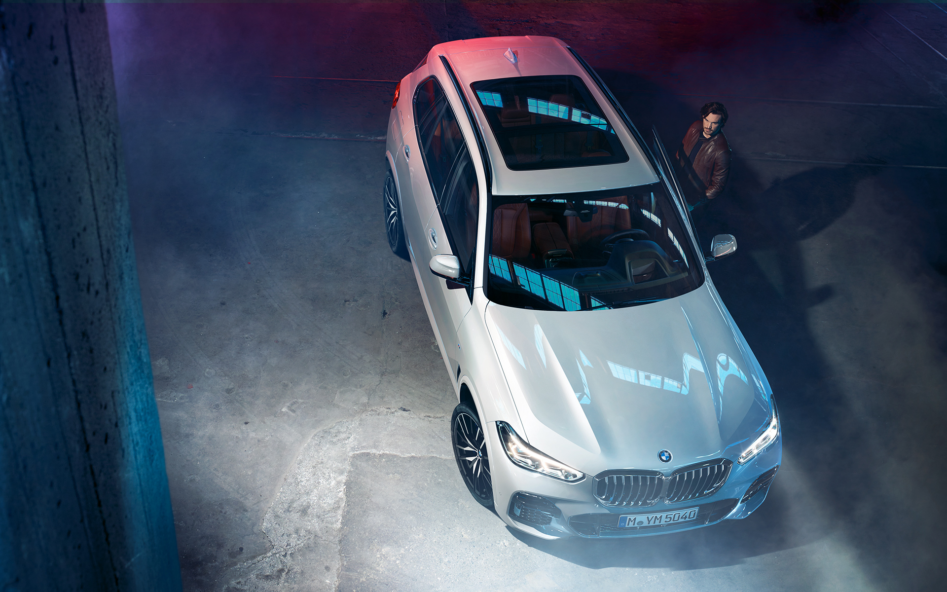 Night-time shot of the BMW X5 from above in an urban setting