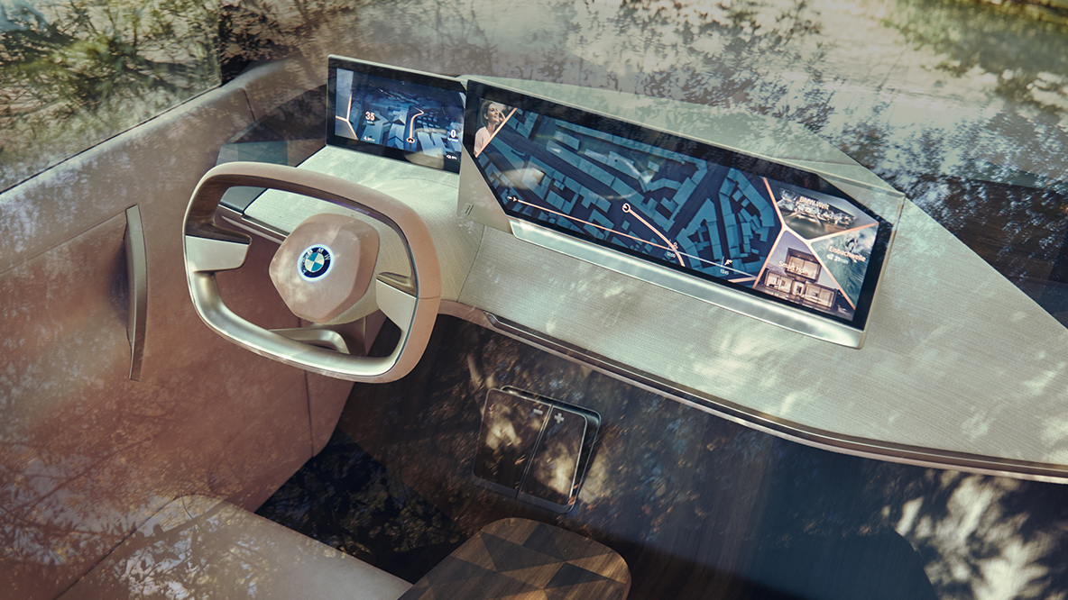 Lugar del conductor BMW Vision iNEXT Lugar del conductor BMW Vision iNEXT con volante y tablero de instrumentos